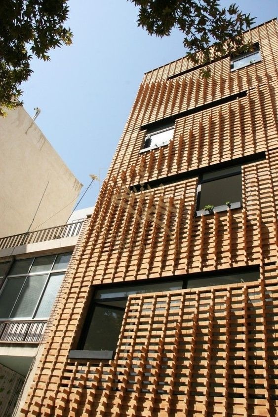 نمونه ای از طراحی نمای ساختمان با آجر